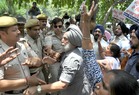Sikh activists holding a protest outside Jammu & Kashmir House against the killing of a Sikh youth in J&K police firing, in New Delhi on Friday. Tribune photo: Manas Ranjan Bhui