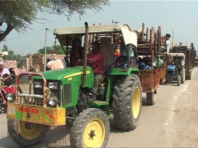 Tension eases, villagers rush back home