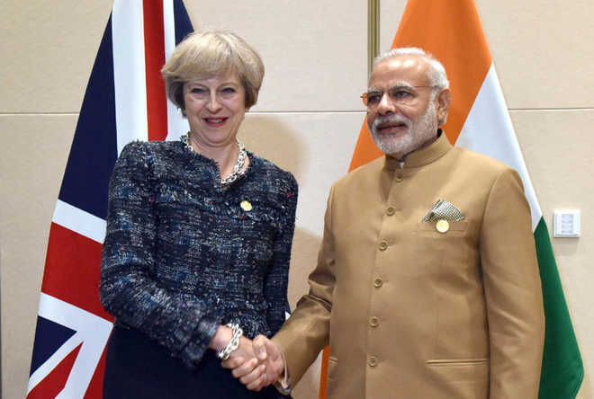 May to raise issue of 6 ex-British soldiers jailed in India