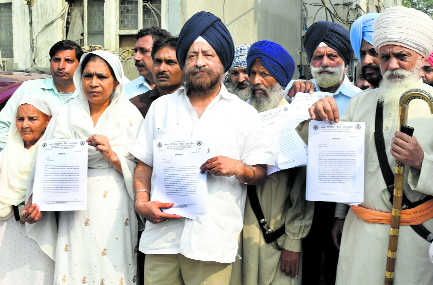 Sikh protestors clamour for punishment for riots accused
