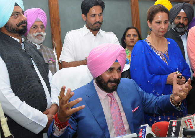 A soldier in Capt’s army: Sidhu on first day in office