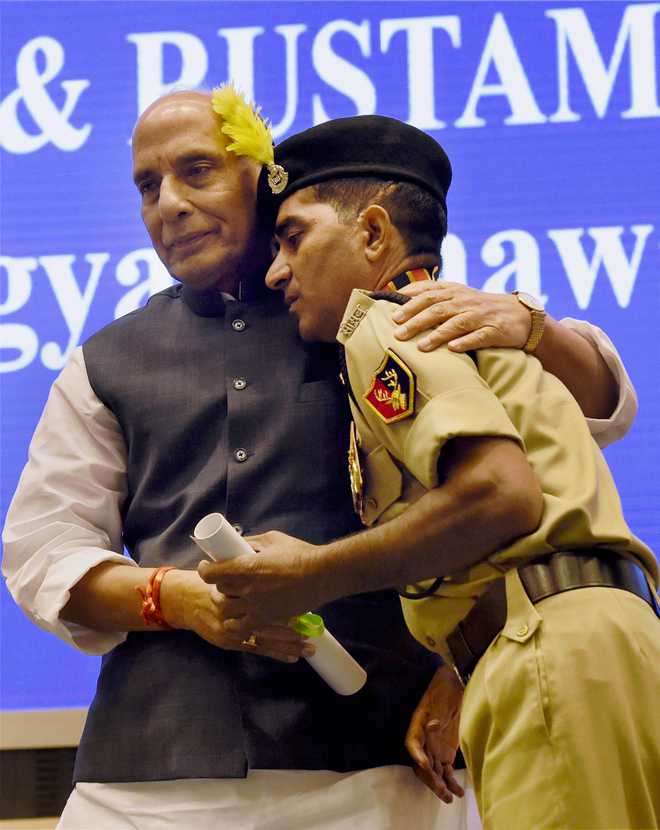Rajnath breaks protocol, hugs brave BSF jawan suffering 85 pc disability