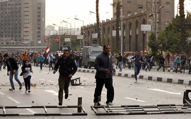 16 killed in clashes as Egypt marks revolt anniversary