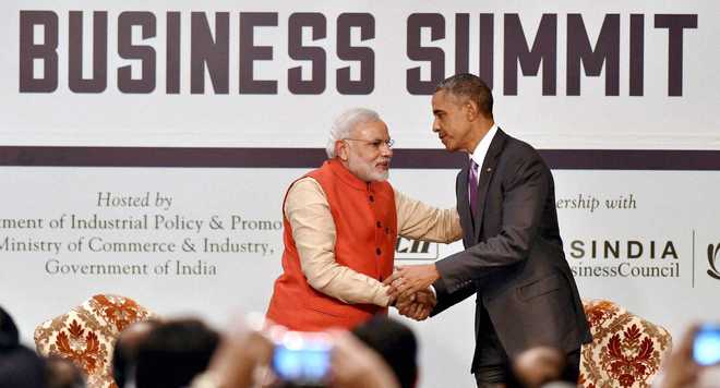 Business barriers will go, promises Modi; Obama raises IPR issue, pledges $4 billion