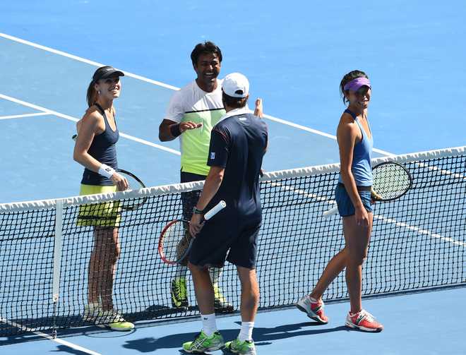 Paes, Hingis storm into final; Sania, Soares bow out
