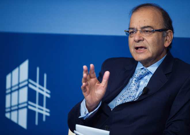 Jaitley bats for automatic info exchange to tackle black money