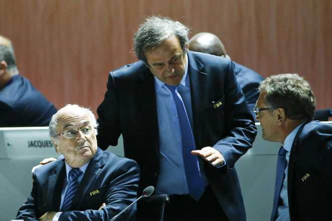 FIFA watchdog suspends Blatter, Platini for 90 days