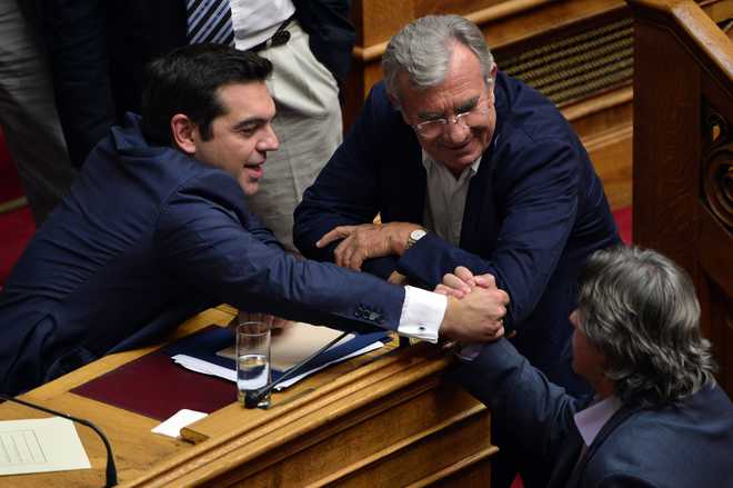 In Greece, Tsipras govt wins key parliament vote