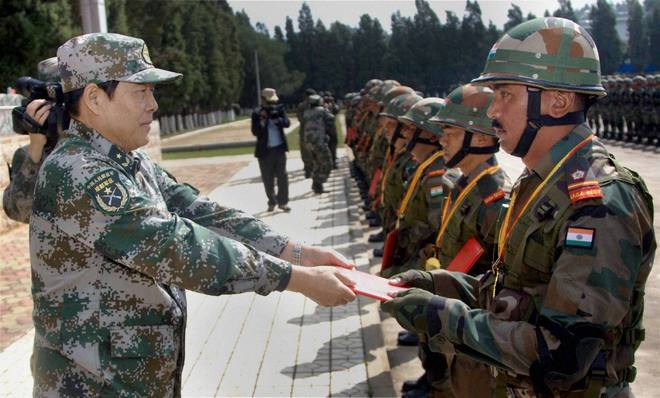 India, China vow to boost ties through military drills