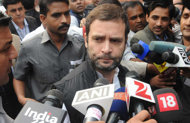 PM invited Sonia, Manmohan under ''public pressure'': Rahul