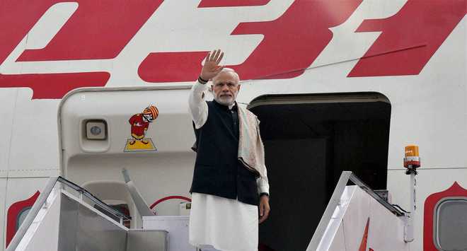 PM leaves for Paris to attend global climate change meet
