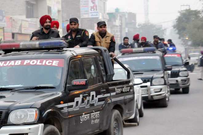 Police conduct flag march in city - The Tribune
