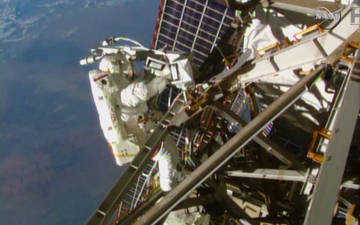 NASA astronauts finish spacewalk trilogy for space taxis