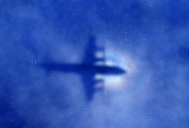 Australia PM suggests MH370 search could be scaled back