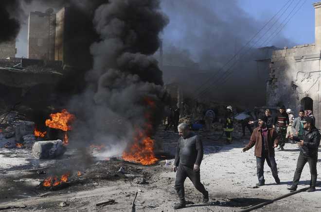 18 killed by regime barrel bomb in Syria: monitor