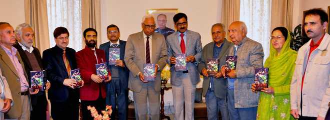 Governor releases Dr Hajini’s book