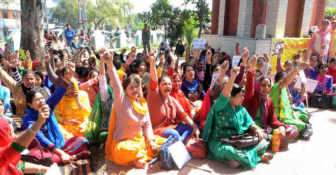 NRHM employees demand better wages, hold protest
