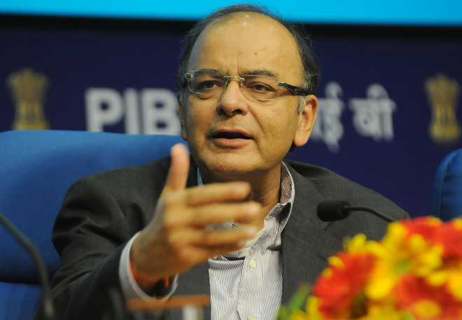 Use cheques, cards to check black money, says Jaitley