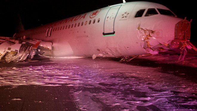 Air Canada jet skids off runway, 23 hurt