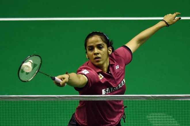 Saina, Srikanth enter second round