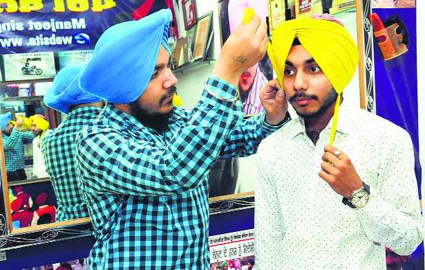 Going global with turban tying, in 22 seconds flat