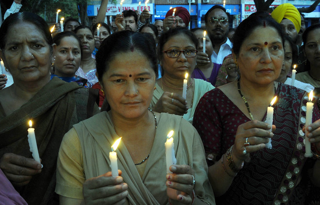 Nepalese families, students pray for the safety of their kin back home
