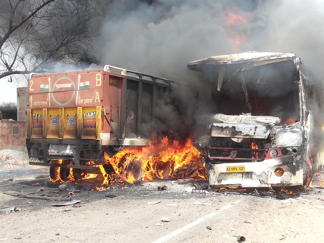 Bus, truck catch fire after collision