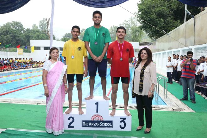 Inter-house swimming contest at Aryan School
