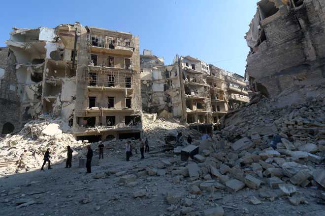 Syria barrel bombs kill 71 civilians as regime army retreats