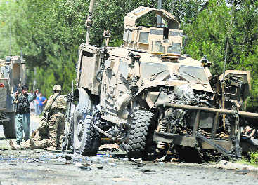 Taliban target NATO convoy & police HQ  in Afghanistan, 3 killed