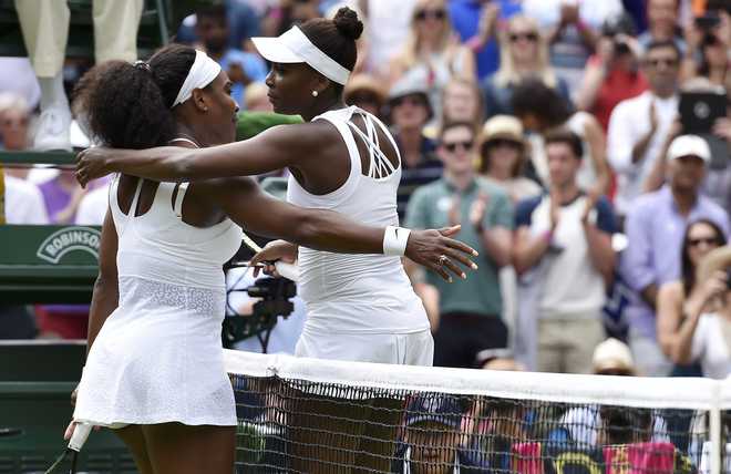 Serena downs Venus to reach Wimbledon quarters