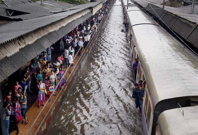 Heavy rain lashes Mumbai; train services hit