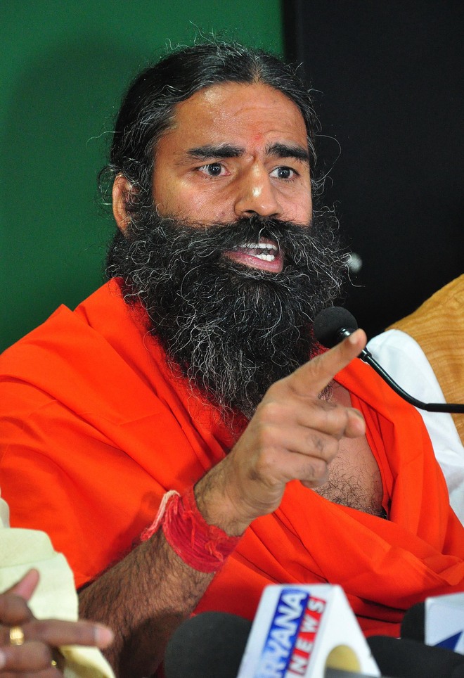Ramdev was allowed to buy 50 acres near Solan in a day by Dhumal govt