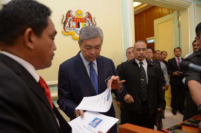 Malaysian PM reshuffles cabinet, appoints new deputy
