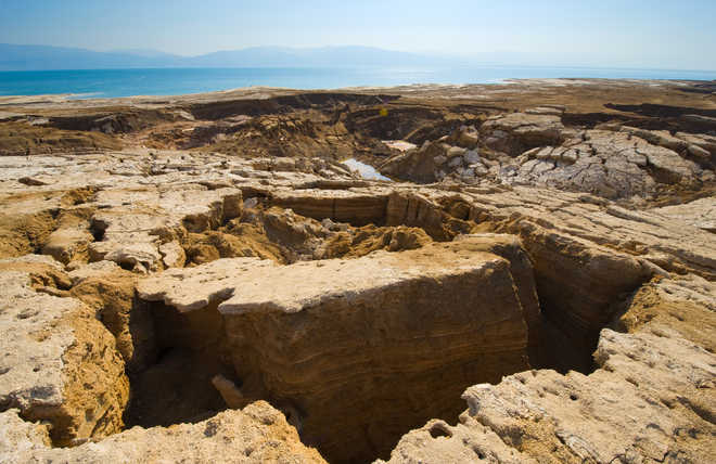 Shrinking Dead Sea leaves trail of perilous sinkholes