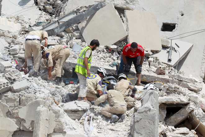 Syrian air raids, warplane crash kill at least 17 people