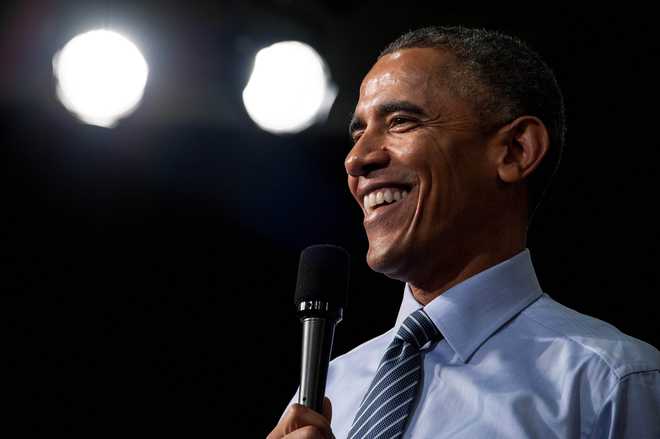 Obama celebrates 54th birthday at a popular restaurant