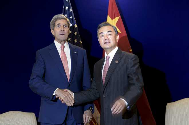 Kerry raises South China Sea concerns with China’s Wang