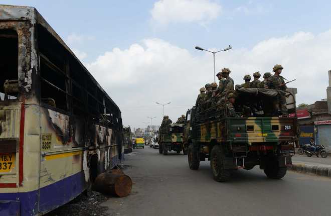 Curfew lifted in 3 areas in Gujarat; Army flag march continues