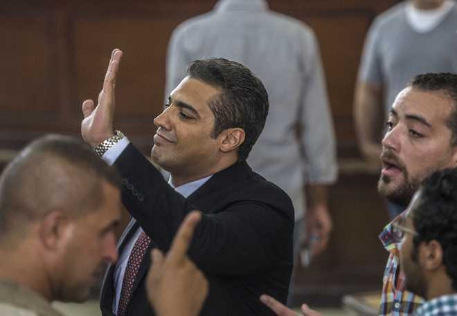 Egypt court sentences 3 Al-Jazeera journalists to 3 years in prison