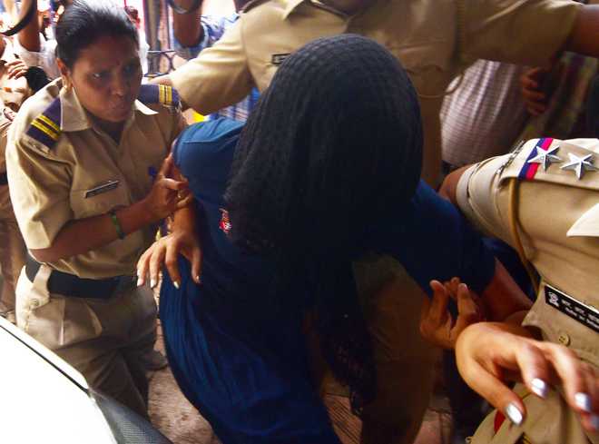 Indrani charged with poisoning son