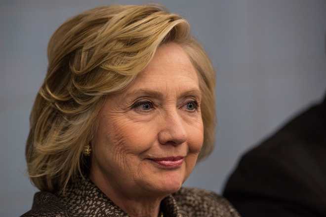 Email saga brings fresh headache for Hillary Clinton