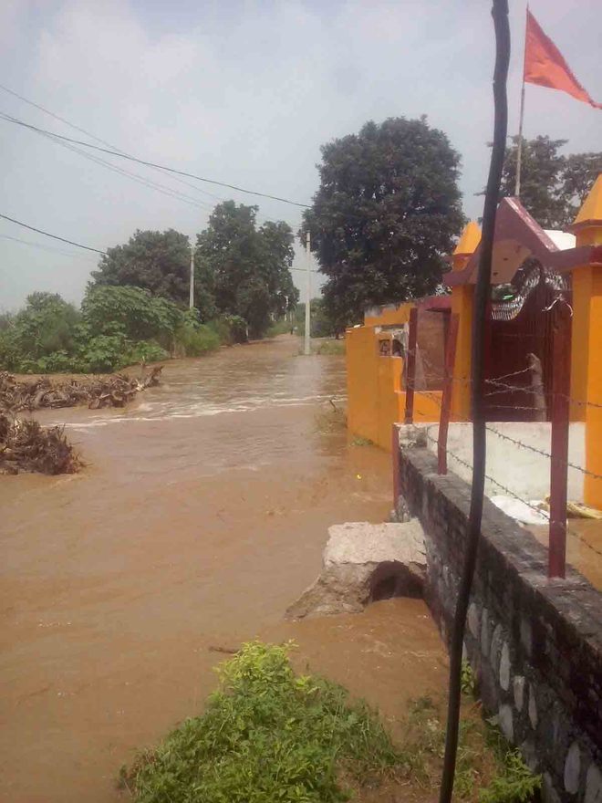 Portion of Ganga canal caves in, village flooded