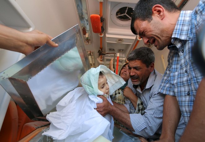 Drowned Syrian boys, mother buried