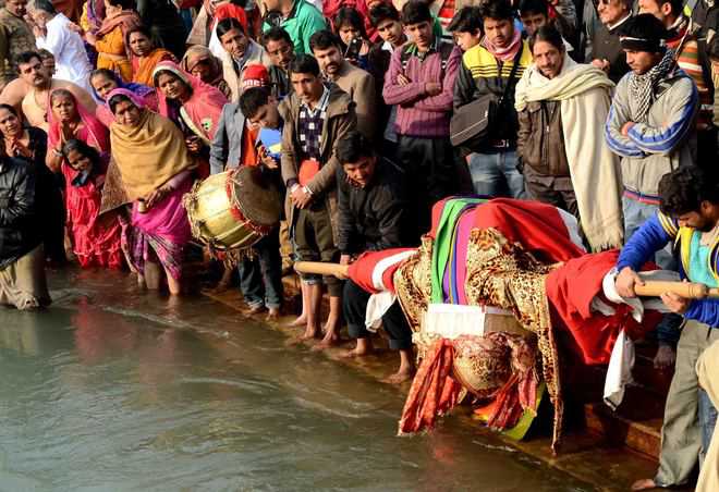 Deities from Garhwal, Kumaon given dip - The Tribune