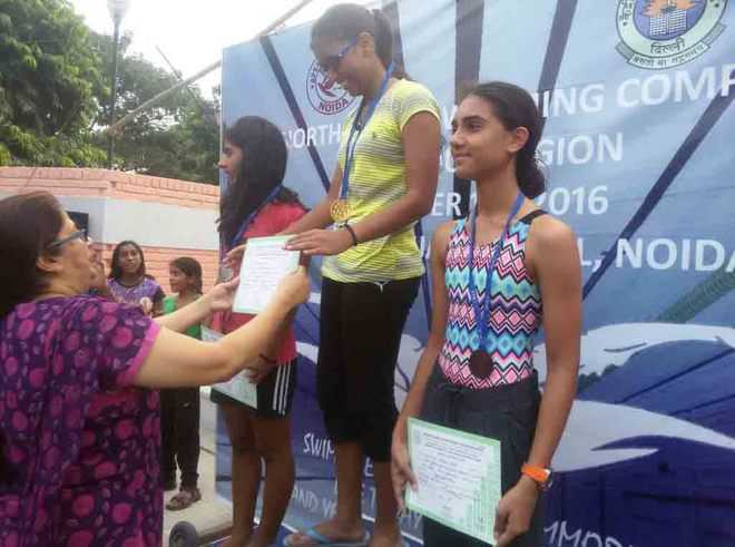 Ecole Globale students shine in CBSE swimming contest