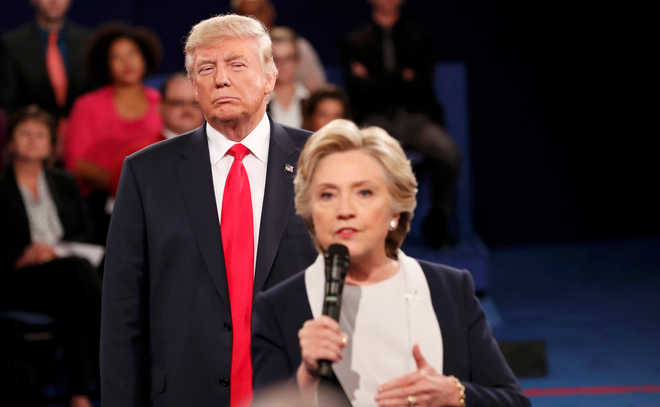 Defiant Trump vows to jail Clinton, attacks Bill in Presidential debate