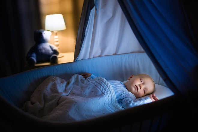Sleeping beside your baby can cause cot death