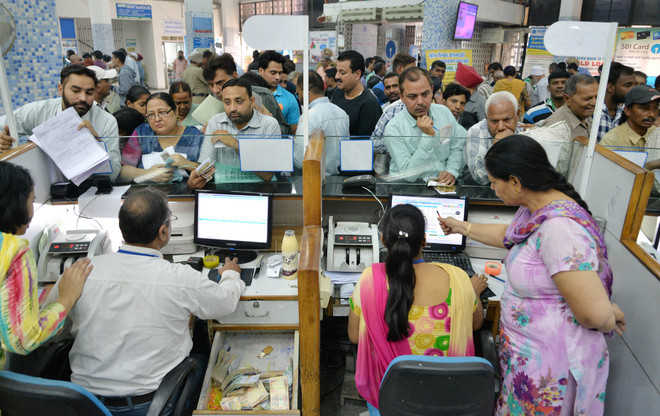 Banks spill over with customers : The Tribune India