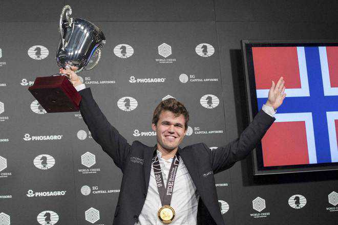 Norwegian beats Karjakin in tiebreaker to win third title in a row